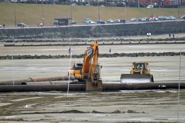 Heavy machinery working on Colwyn Bay beach KONICA MINOLTA DIGITAL CAMERA