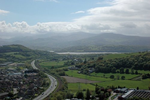 The A55 snakes towards  the Conwy Estuary with view of Snowdonia beyond