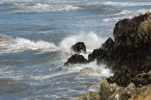 Waves splashing onto rocks