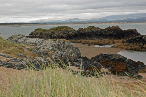 A view from the island across the 'bottom' end of Newborough Warren and Caernarfon Bay to Snowdonia, where some of the mountains were in sunshine