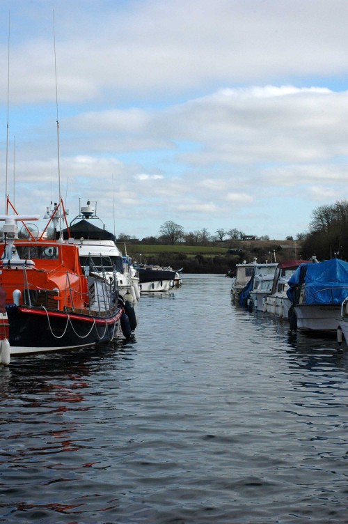 Boats and barges moored on the canal